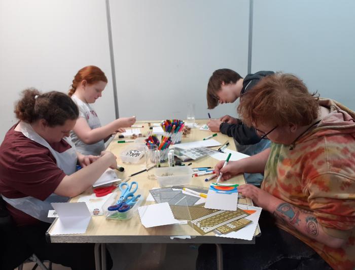 Young carers doing batik